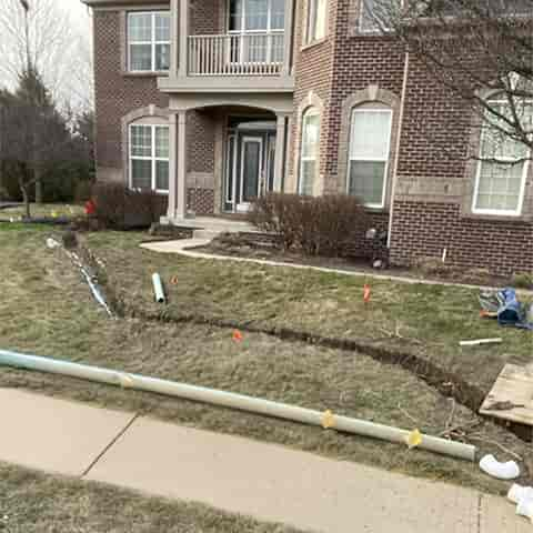 We were able to trench line to street from house for sump pump discharge line pipe. No damage to utilities, especially to the under ground dog fence.