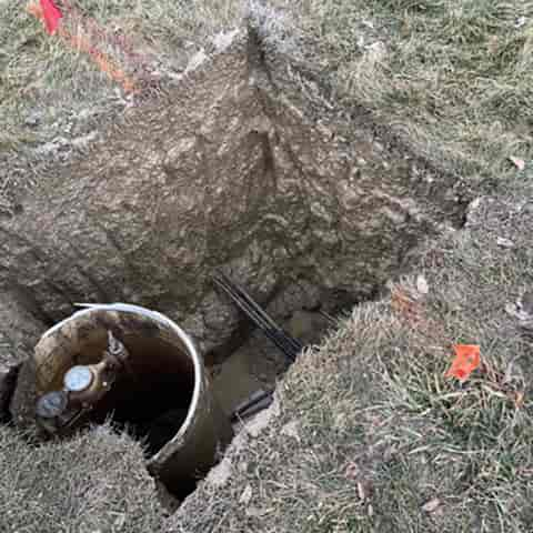 We were able to find utilities next to the water meter pit without damaging the meter pit or the power service lines running next to the water meter pit. We ran new supply to water meter pit - the old service was leaking.